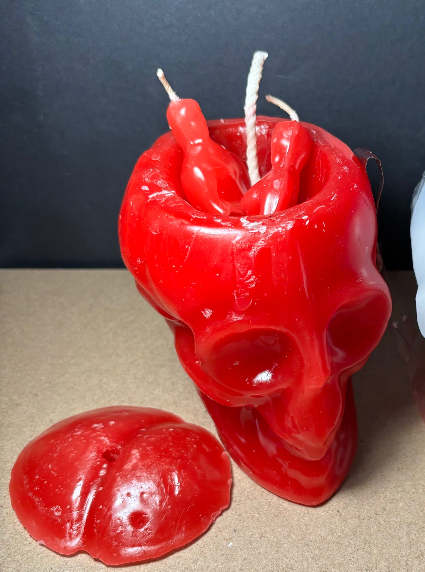 Skull Candle with Couple Inside